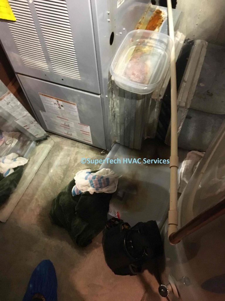 Why Is My Furnace Leaking Water? How To Fix It [With Pictures]