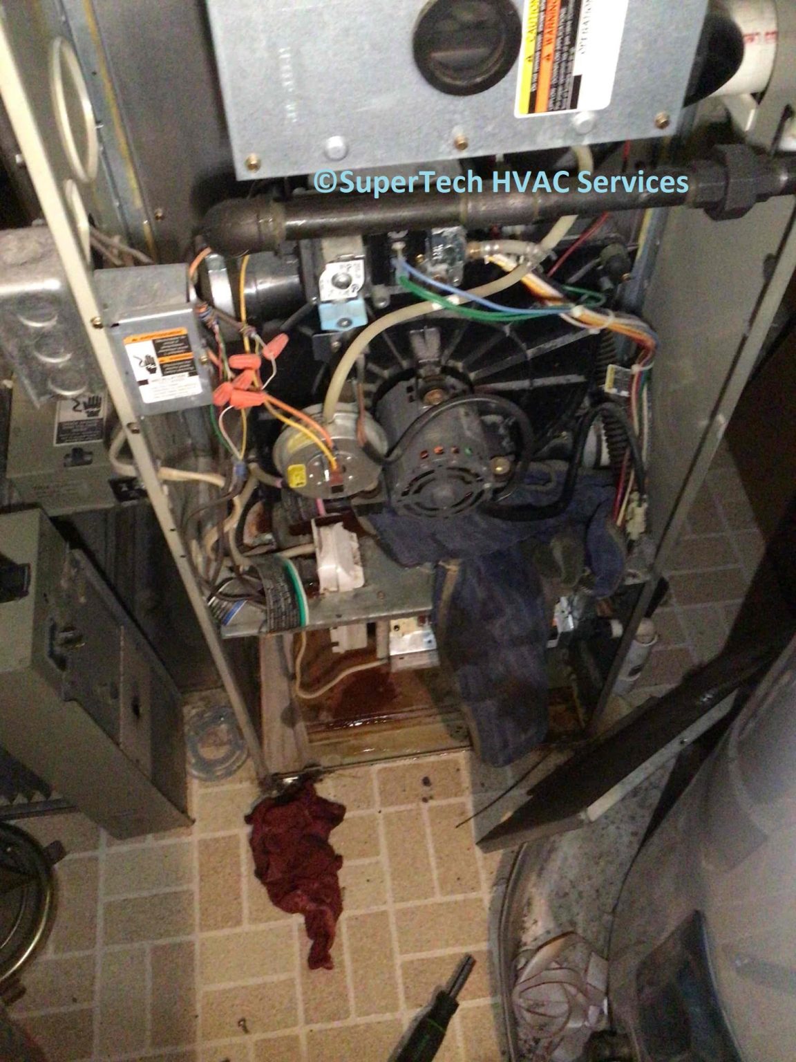 Why Is My Furnace Leaking Water? How To Fix It [With Pictures]